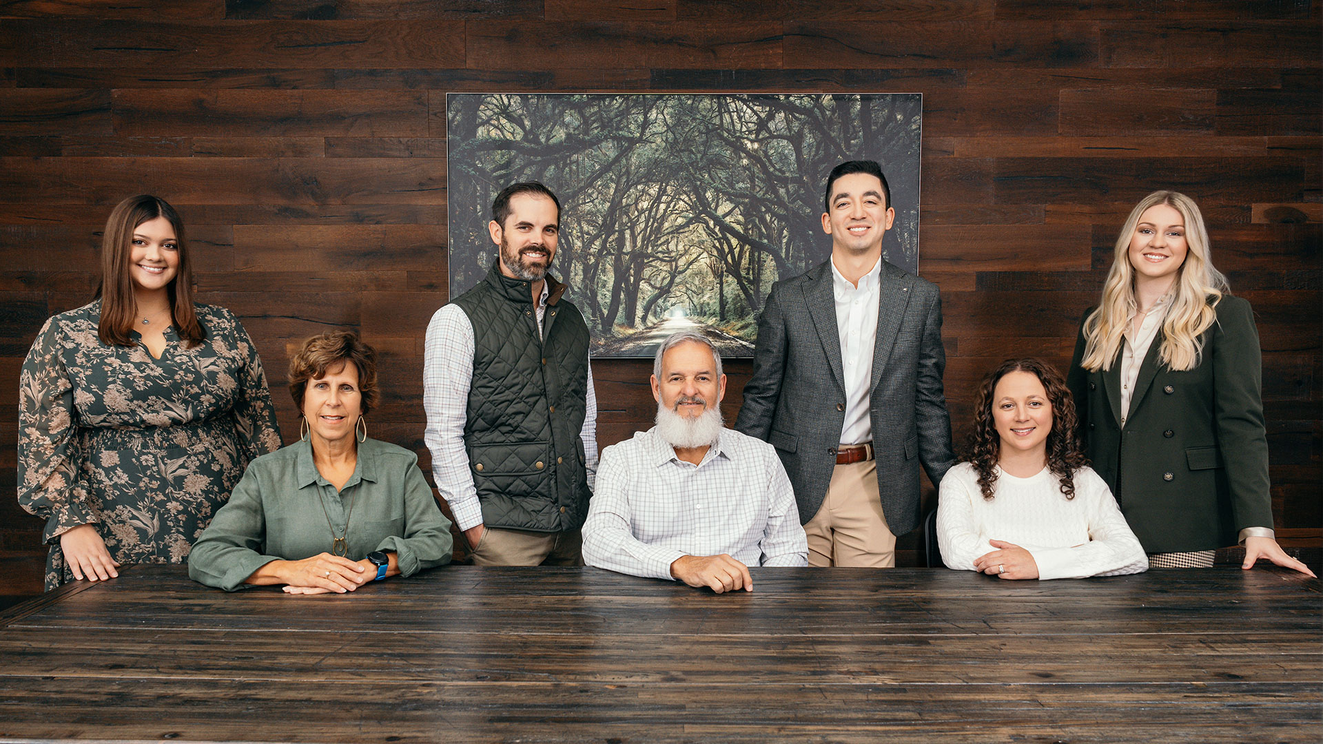 team photo of everyone at a table
